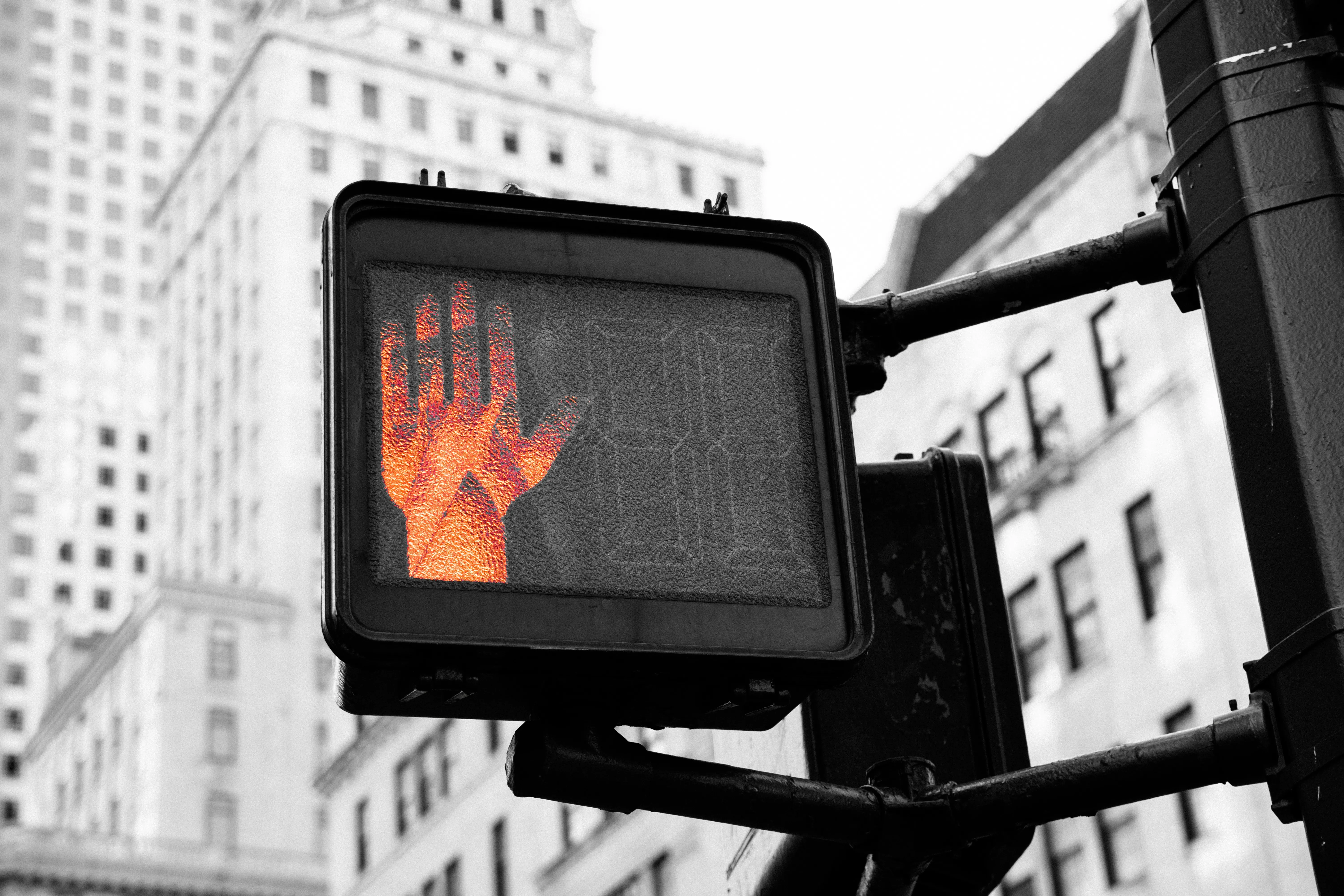 Close-up photo of street go and stop signage displaying stop